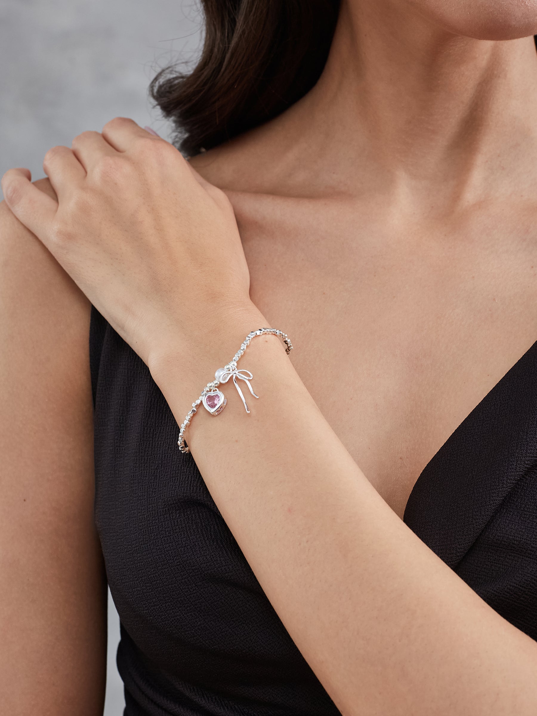 Latin Quarters Women's Silver Beaded Bracelet with Pink Heart and Bow Charms