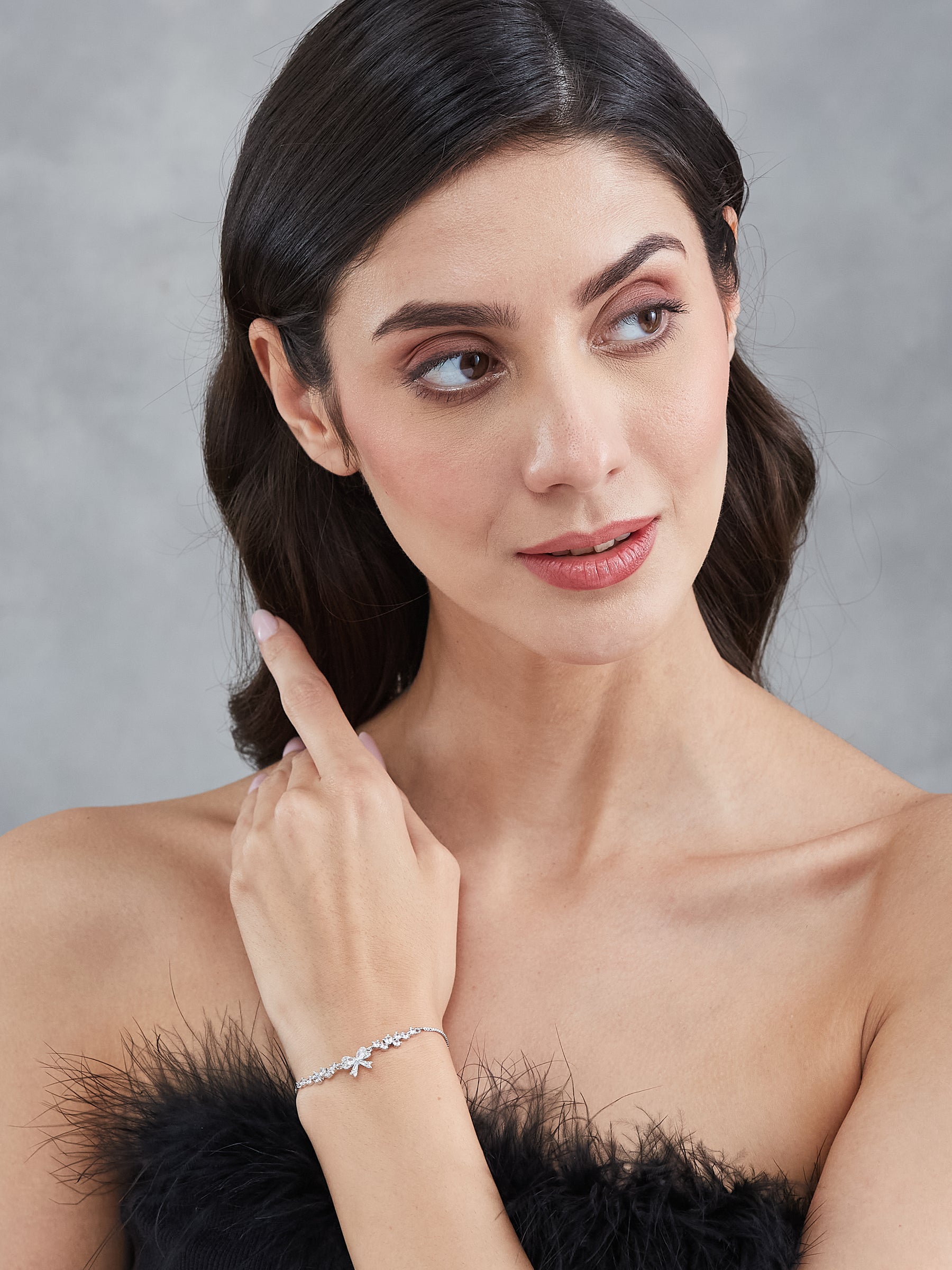 Latin Quarters Women's Adjustable Silver Bow Bracelet