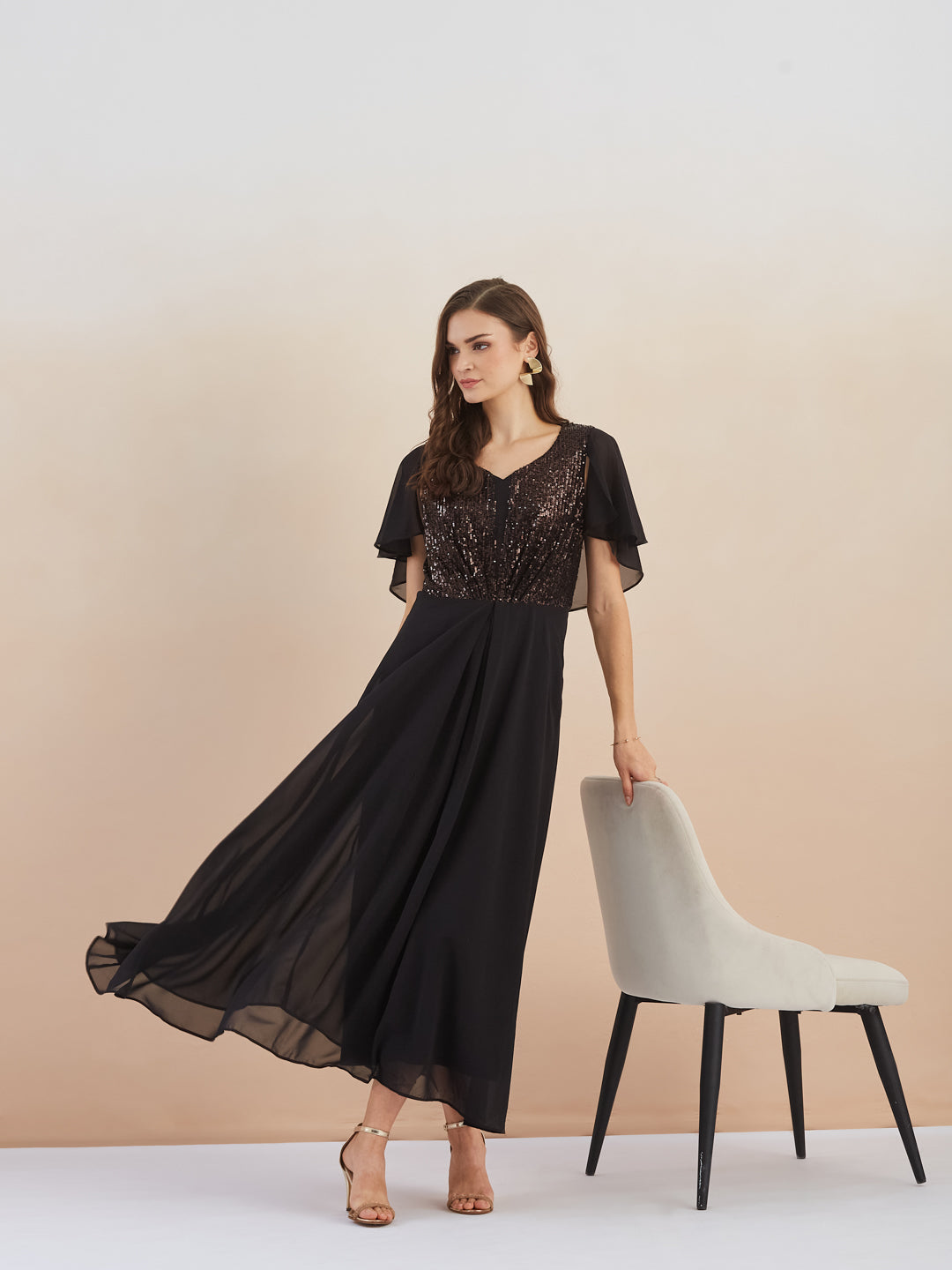 Latin Quarters Women Black Sequin Flutter Sleeve Flared Maxi Dress for Evening Wear