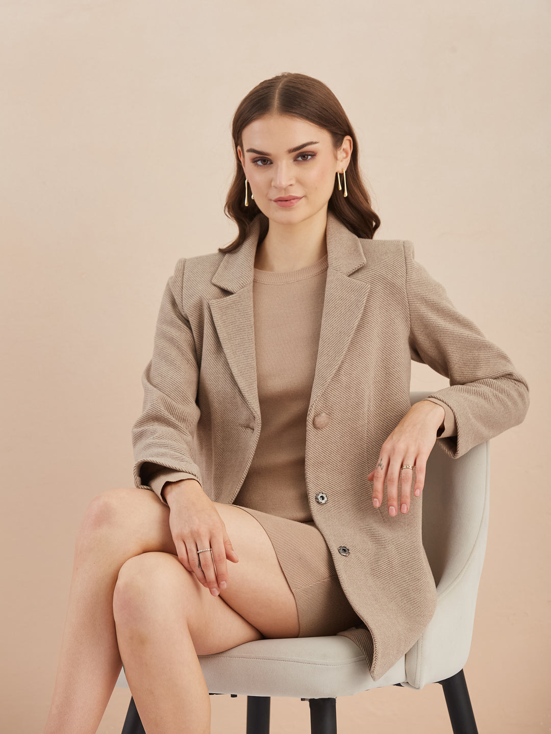 Latin Quarters Women Beige Solid Full Sleeves Lapel Neck Long Coat for Casual Occasion