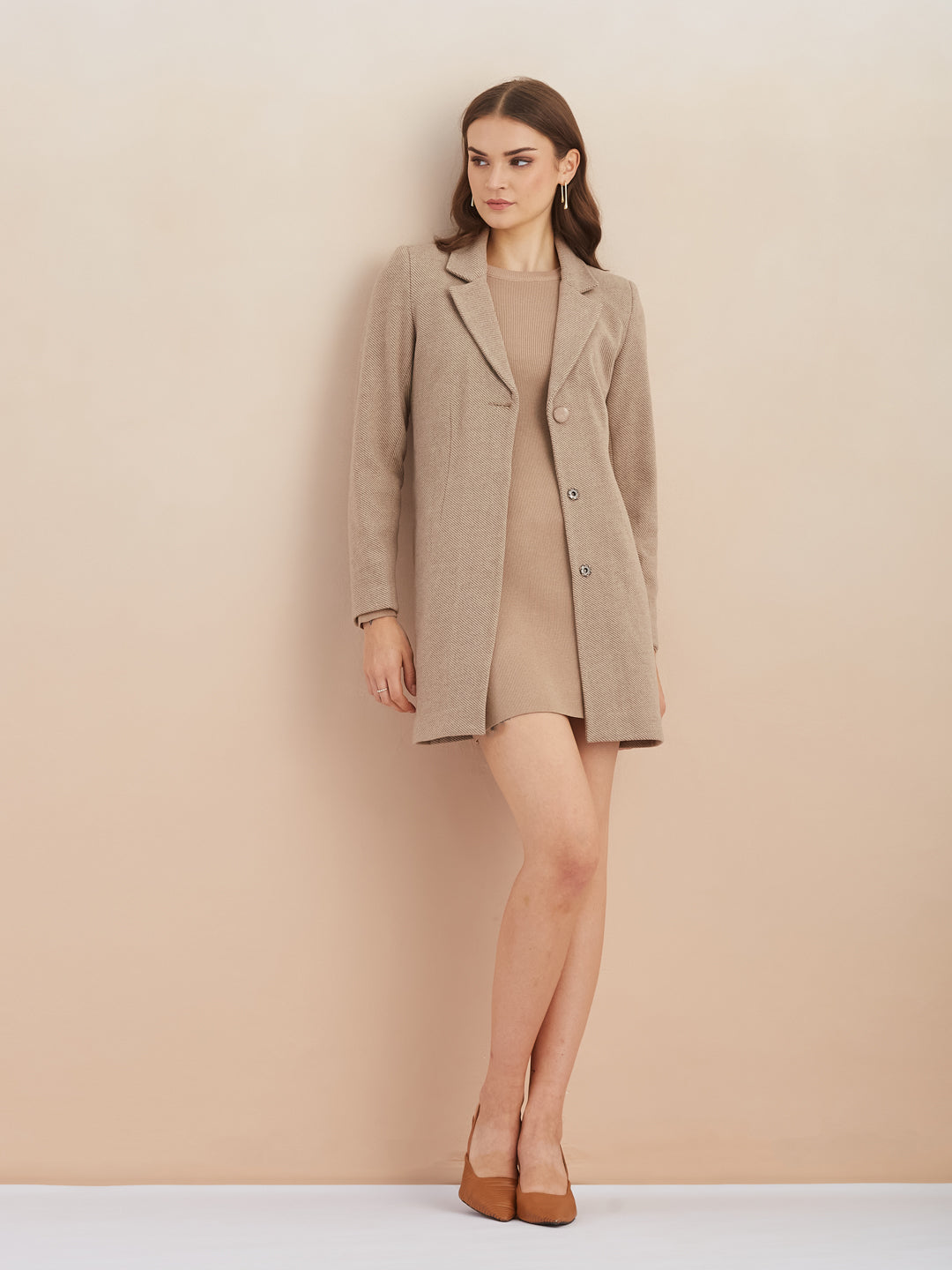 Latin Quarters Women Beige Solid Full Sleeves Lapel Neck Long Coat for Casual Occasion