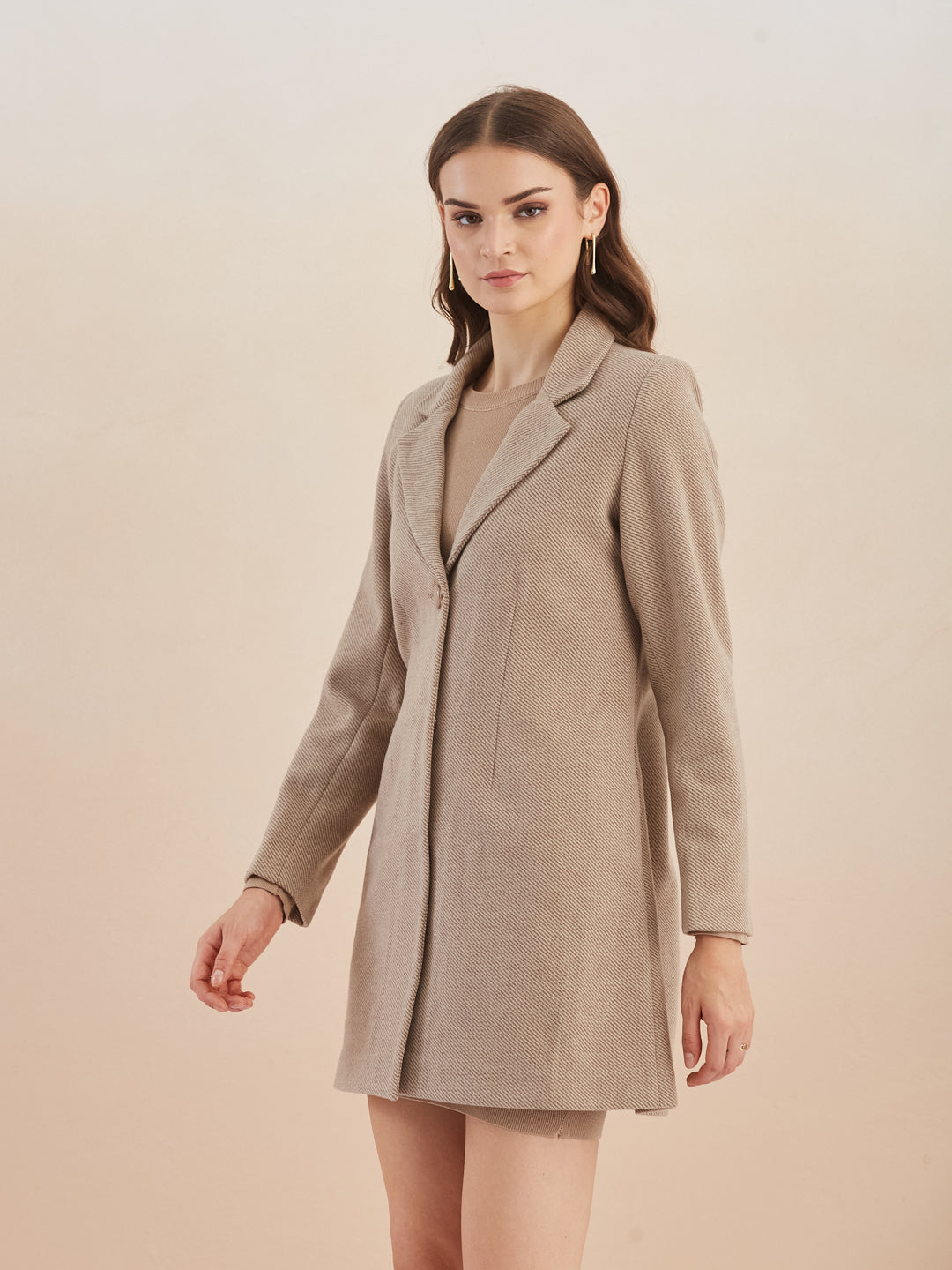 Latin Quarters Women Beige Solid Full Sleeves Lapel Neck Long Coat for Casual Occasion