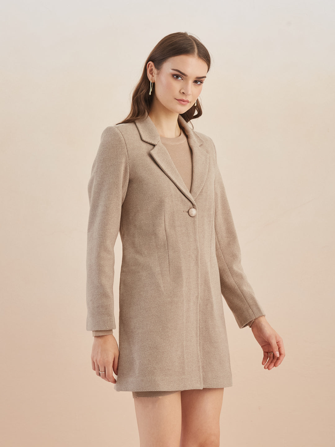 Latin Quarters Women Beige Solid Full Sleeves Lapel Neck Long Coat for Casual Occasion