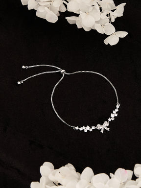 Latin Quarters Women's Adjustable Silver Bow Bracelet