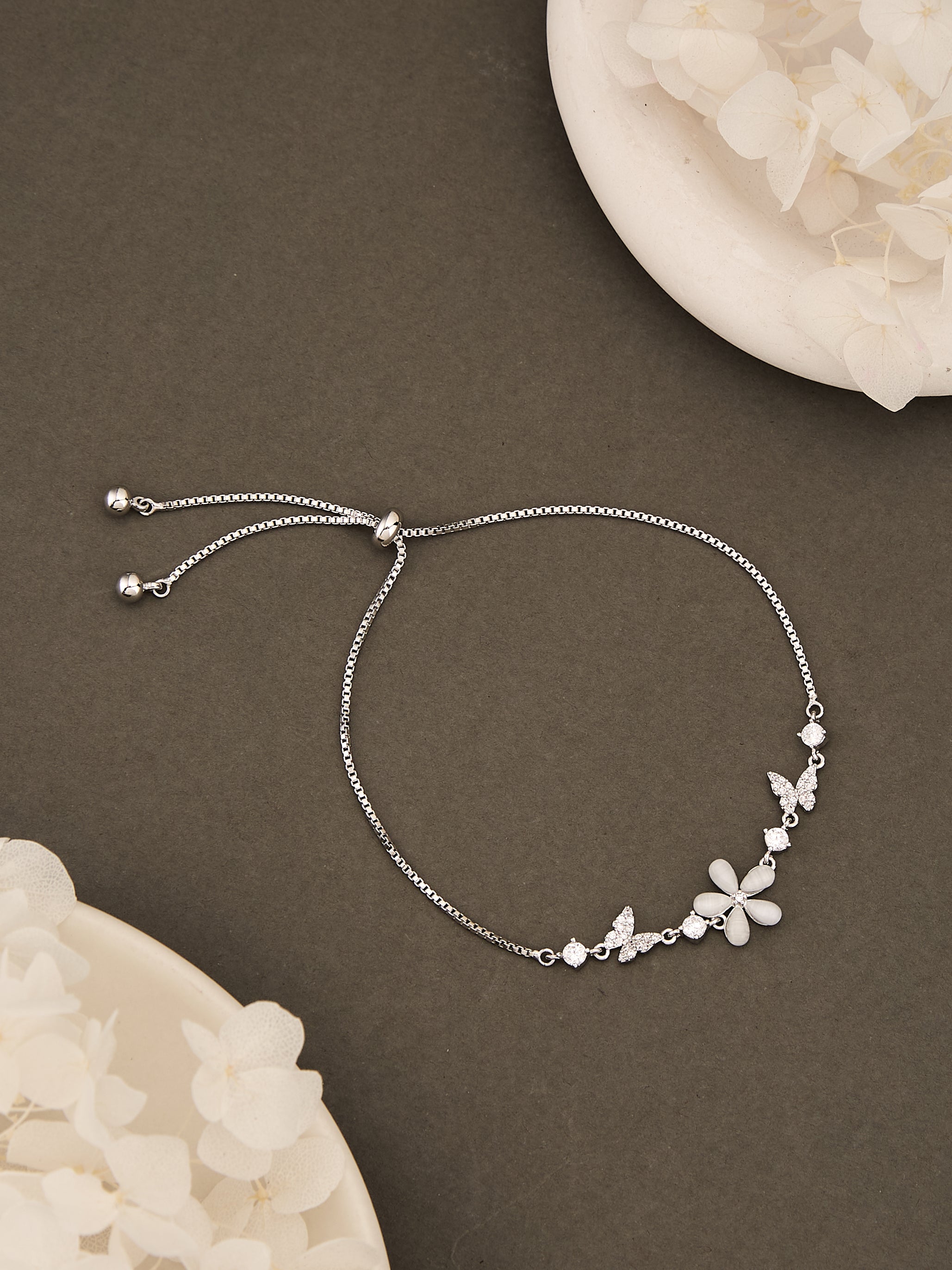 Latin Quarters Women's Adjustable Silver Flower and Butterfly Bracelet