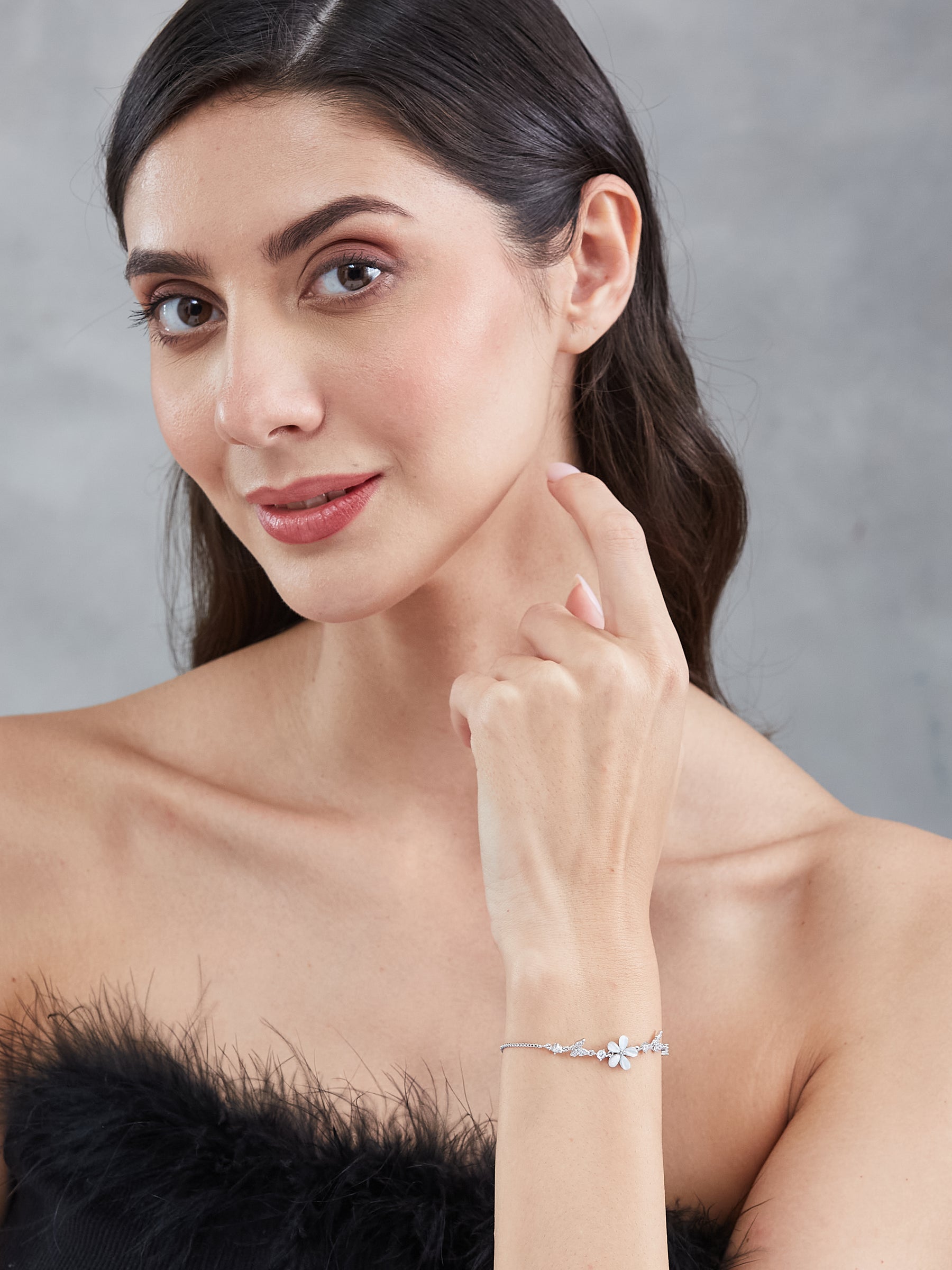 Latin Quarters Women's Adjustable Silver Flower and Butterfly Bracelet