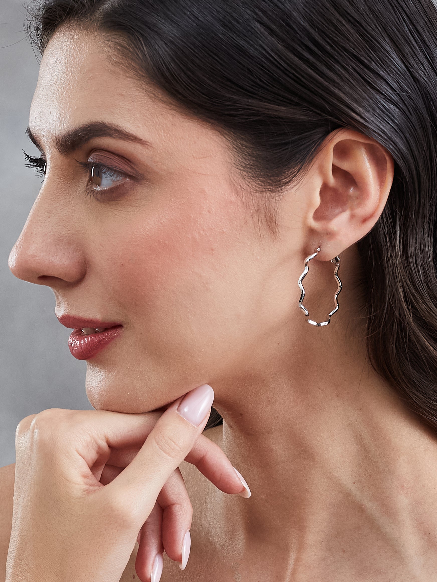 Latin Quarters Women's Wavy Silver Toned Hoop Earrings