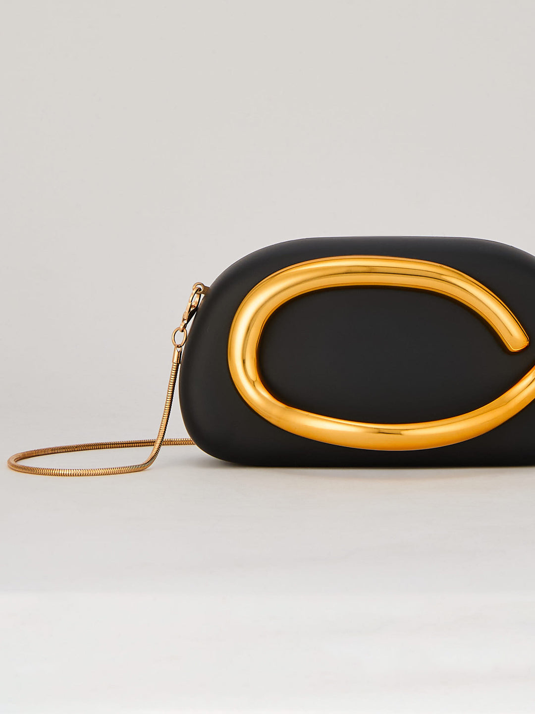 Latin Quarters Women's Black Statement Curved Clutch with Chain Strap