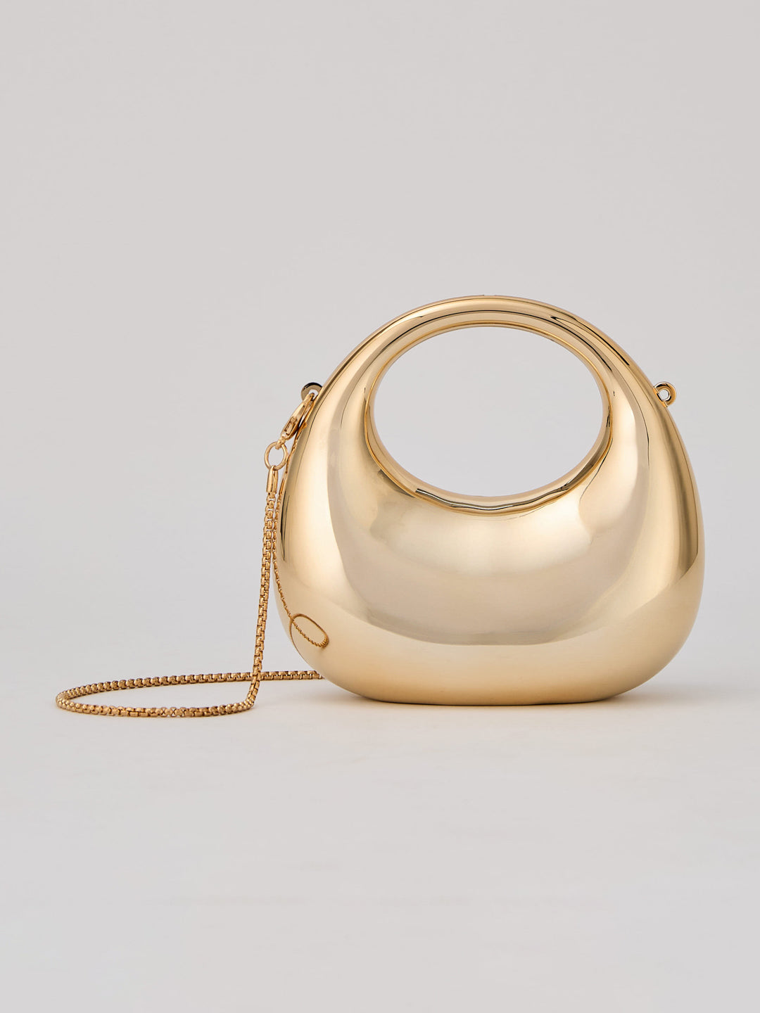 Latin Quarters Women's Metallic Golden Sculptural Cutout Clutch with Top Handle & Chain Strap