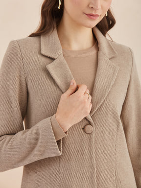 Latin Quarters Women Beige Solid Full Sleeves Lapel Neck Long Coat for Casual Occasion